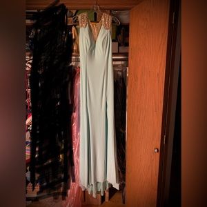 Tony Bowls Evening Gown with slit, cap sleeve and open back with mesh sequin